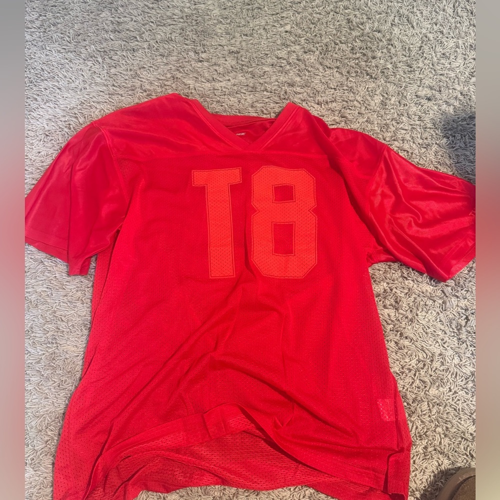Tate McRae red tour jersey